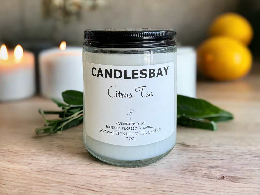 A handcrafted scented soy blend candle at our store. The candle is