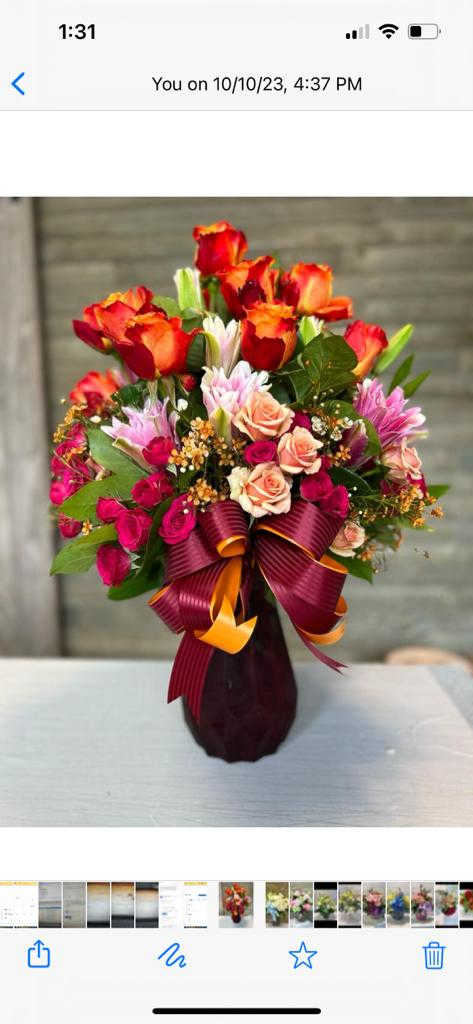 This vibrant floral arrangement is a celebration of love and passion 