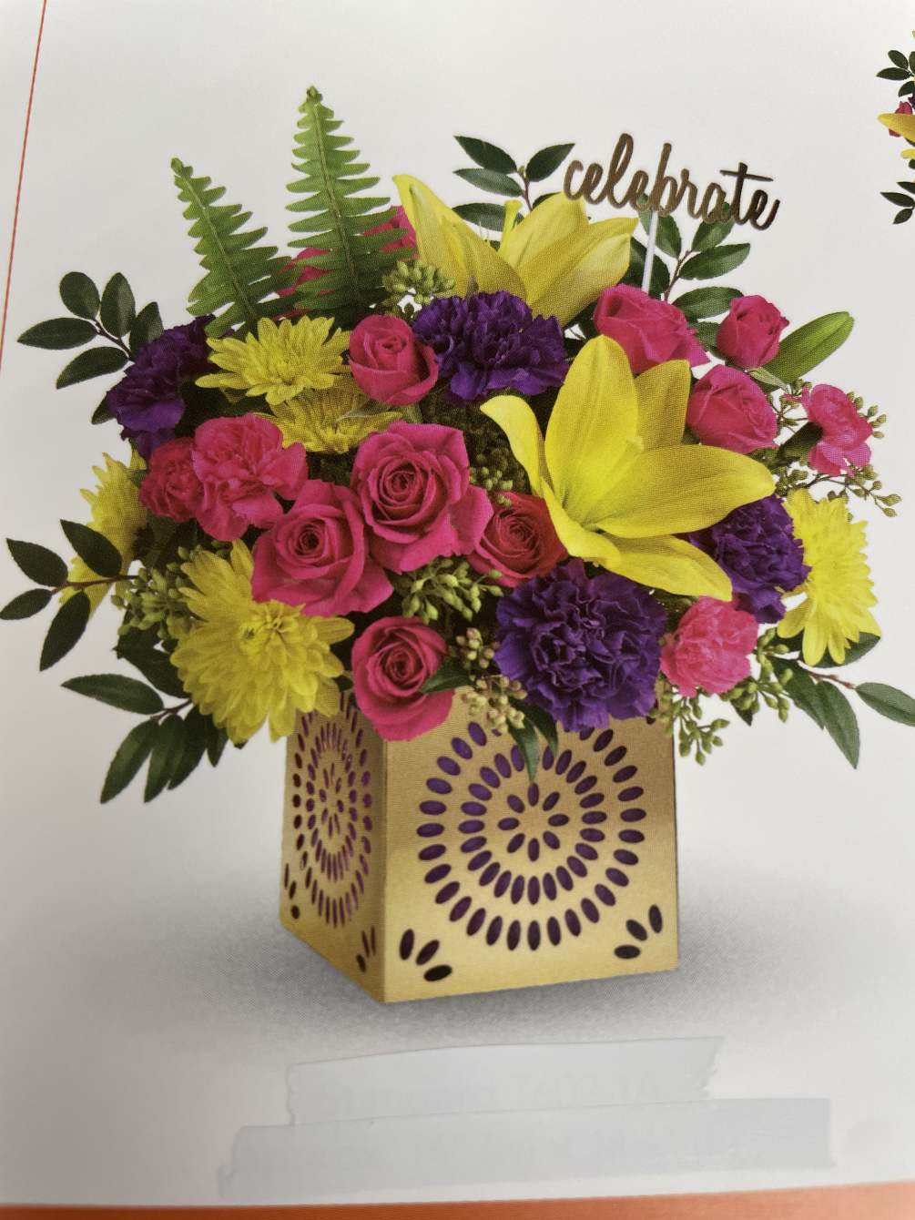 This arrangement may contain roses, carnations, lilies, chrysanthemums, huckleberry, or others. Standard