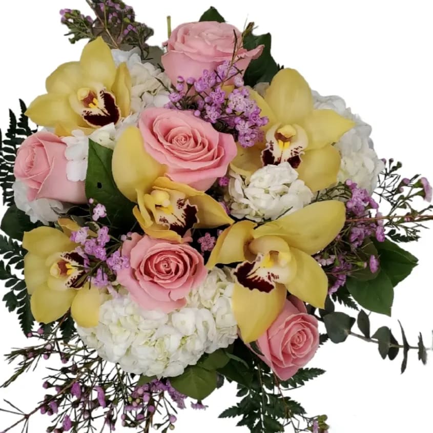 A brilliant, beautiful, and bursting creation featuring luxurious blooms in yellow 