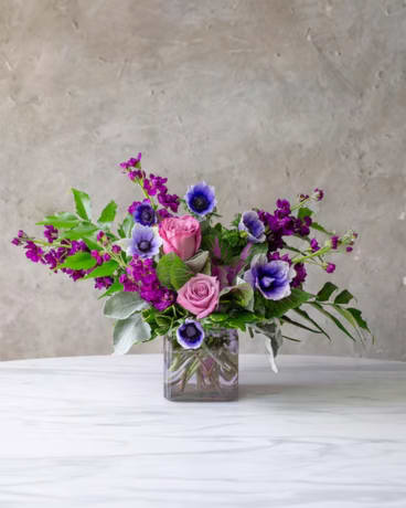 Blueberry display of lavender blooms like roses and stock with a mixture