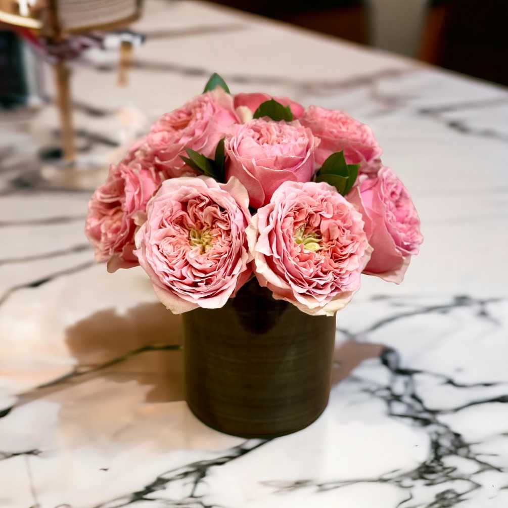 Pink Monster Garden Roses arranged in a 5x5 cylinder vase accented with