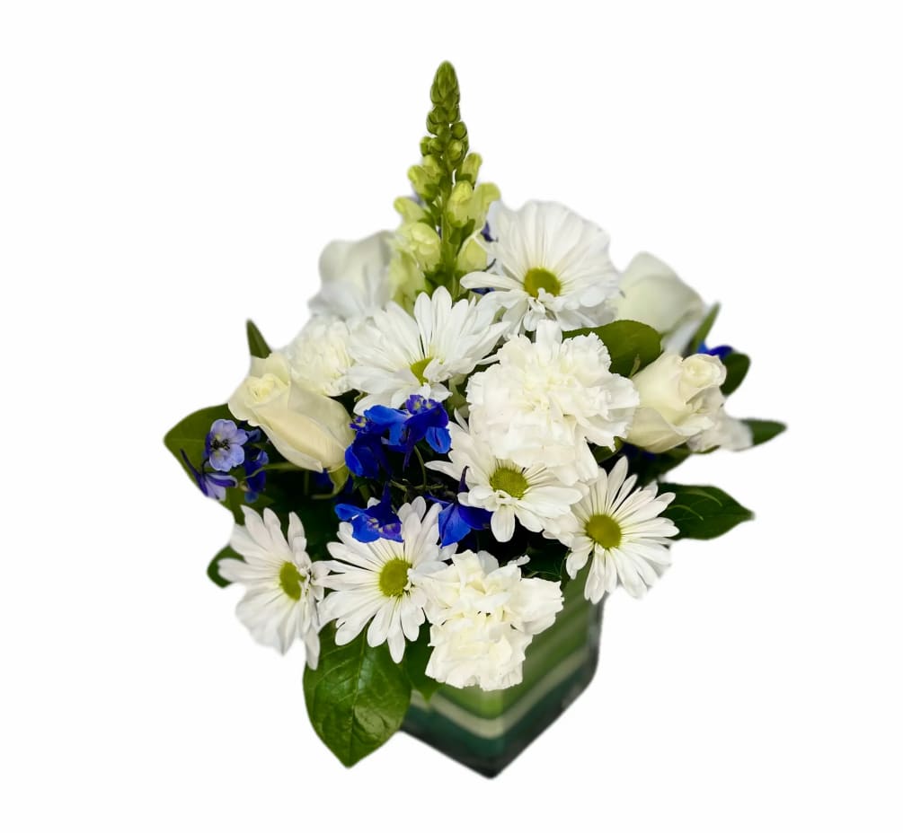 Mixed arrangement in a cube vase with floral foam