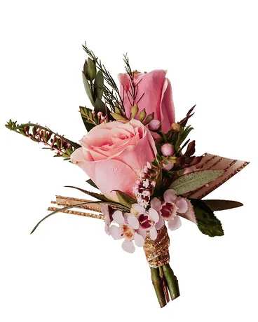 The Molly&#039;s Love Boutonniere features pink roses and blooms with accent ribbon.