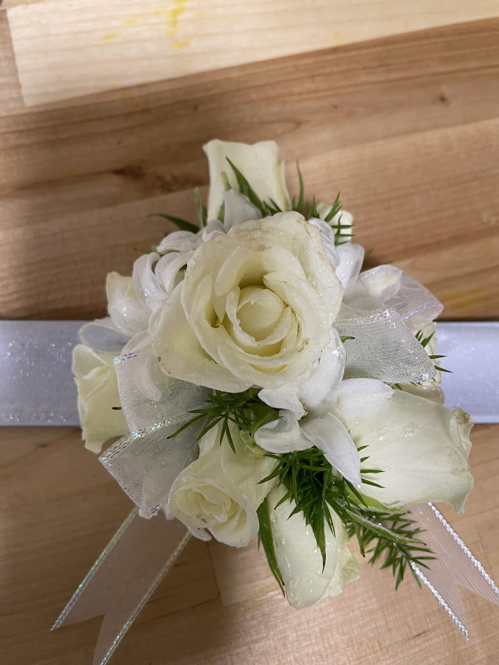 A white corsage for prom and weddings! Corsage colors and ribbon can