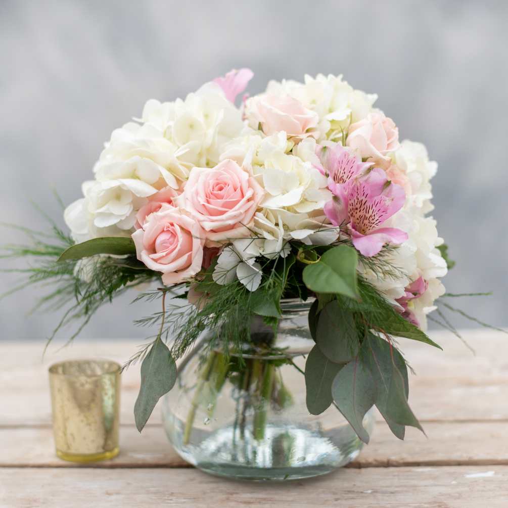Surely Mom will love this delicate, sweet, pink, white and lavender arrangement