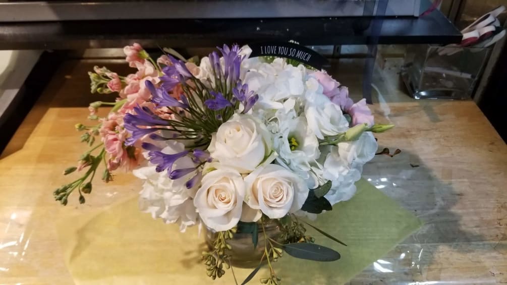 This is a small arrangement with a vase of our designer&#039;s choice.
When