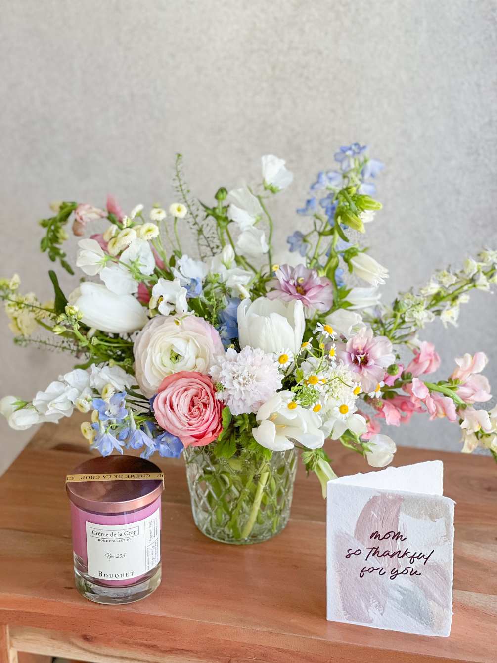 A gift every mom will LOVE! A seasonal Designer&#039;s Choice arrangement paired