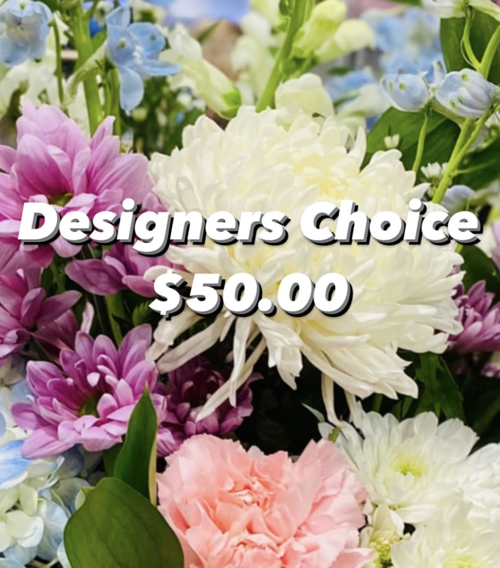 Loose cut fresh flower bouquet. **NO VASE** Wrapped in decorative paper with