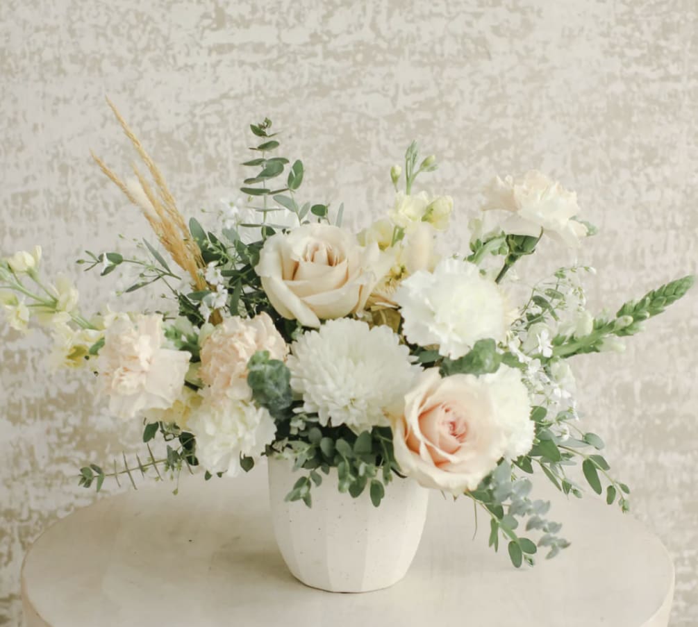 Soft petals in beautiful neutral tones of white, cream, sage, light greys