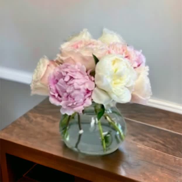 6 beautiful peonies in a vase. The varieties and colors will vary