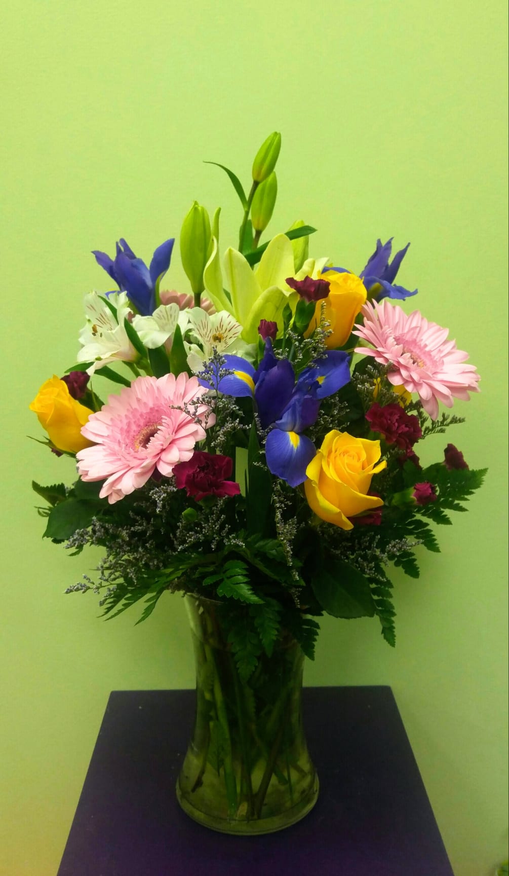 This sensational bouquet is full of spring colors, flowers, and feeling. It