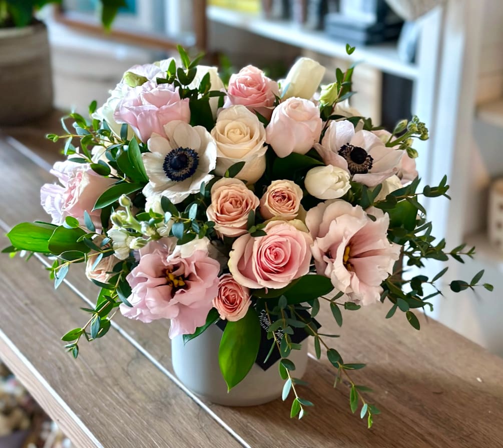 Imagine a soft, delicate pink arrangement that combines the grace of Pink