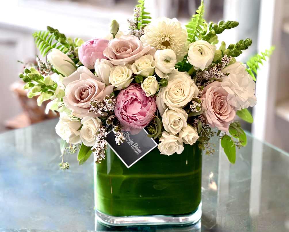 Introducing the breathtaking Bisou arrangement&mdash;a truly beautiful mix of lush cream and