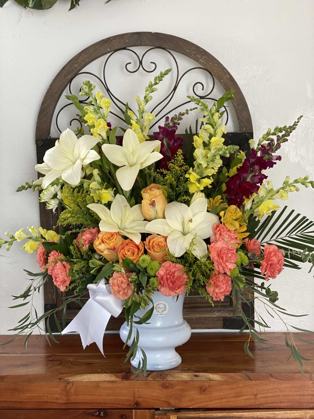 Sympathy Bouquet in white,yellow and red flowers, in white plastic vase, Special