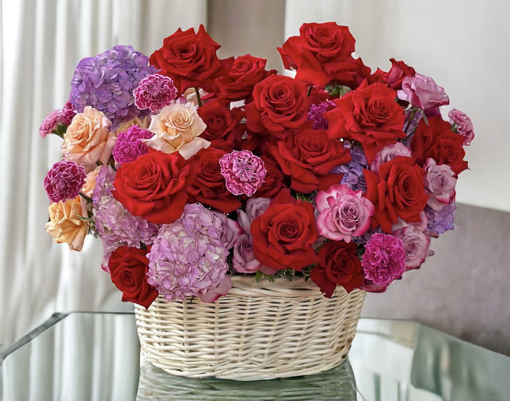   The awe-inspiring, colossal crimson roses, swathed in clouds of lilac
