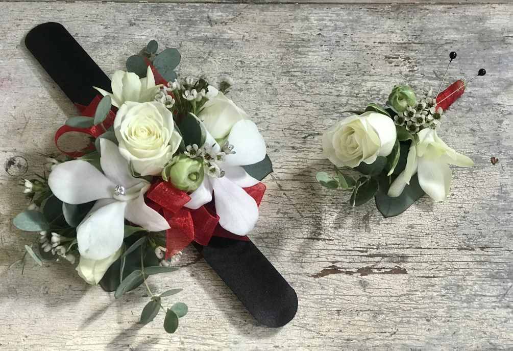 Let us custom design a wrist corsage and a coordinating boutonniere for