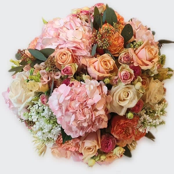 Best available selection of seasonal flowers in nude tones.