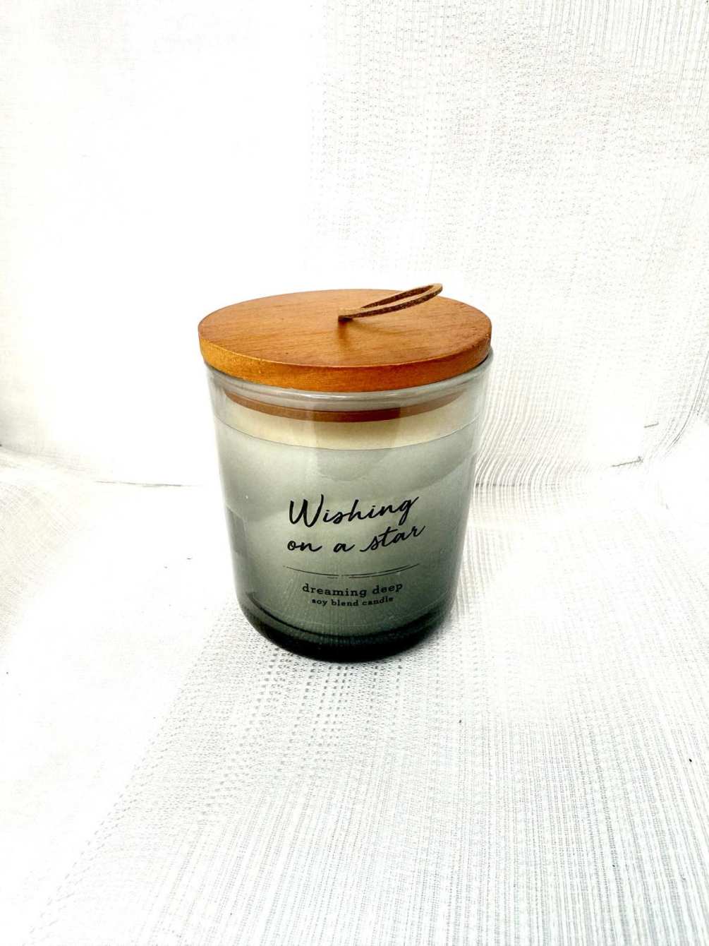 Dreaming Deep scented soy blend candle.
Lid has quote on inside of candle-