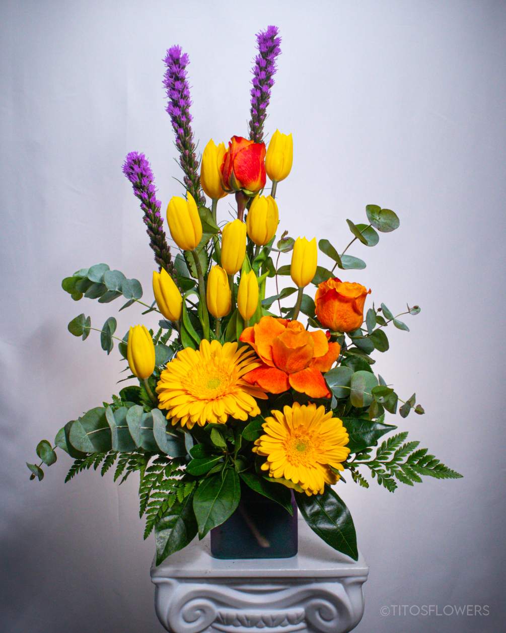 &ldquo;Experience the harmony of a sunset with our captivating arrangement, Golden Glow