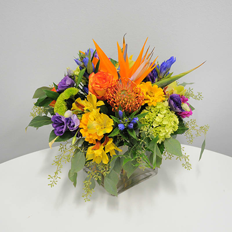 
&quot;Get ready to brighten your day with our happy glass cube arrangement