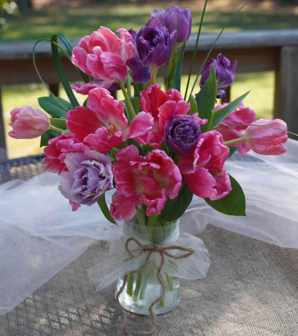 Our Timeless Tulips are fresh from the farm and elegantly arranged with