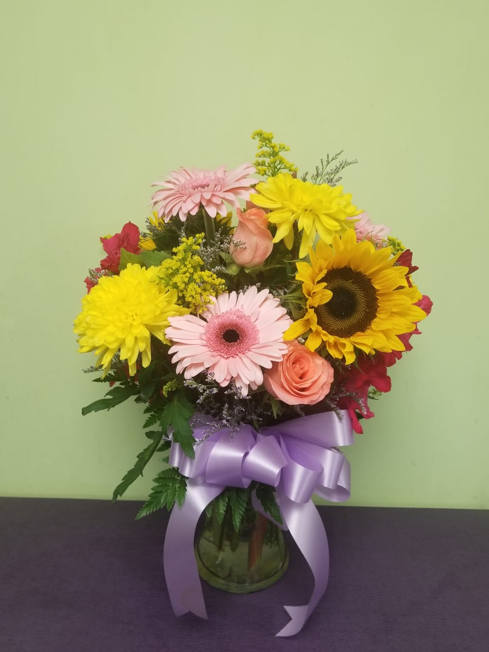 A beautiful garden of flowers is enough to send some sunshine! Arrangement