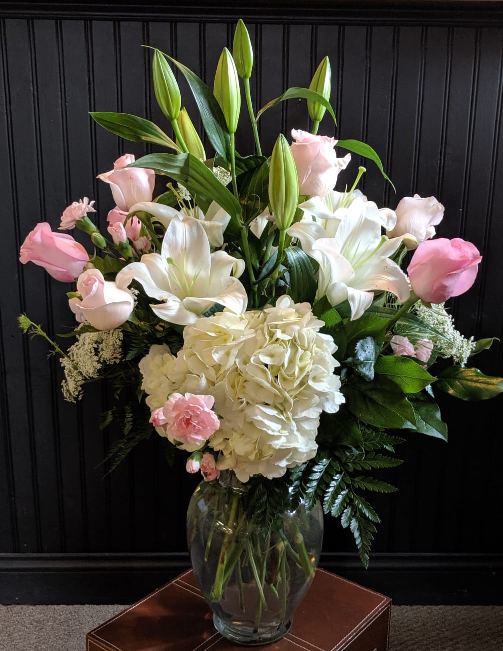 This stunning arrangement with Hydrangeas, lilies, roses, mini carnations is sure take