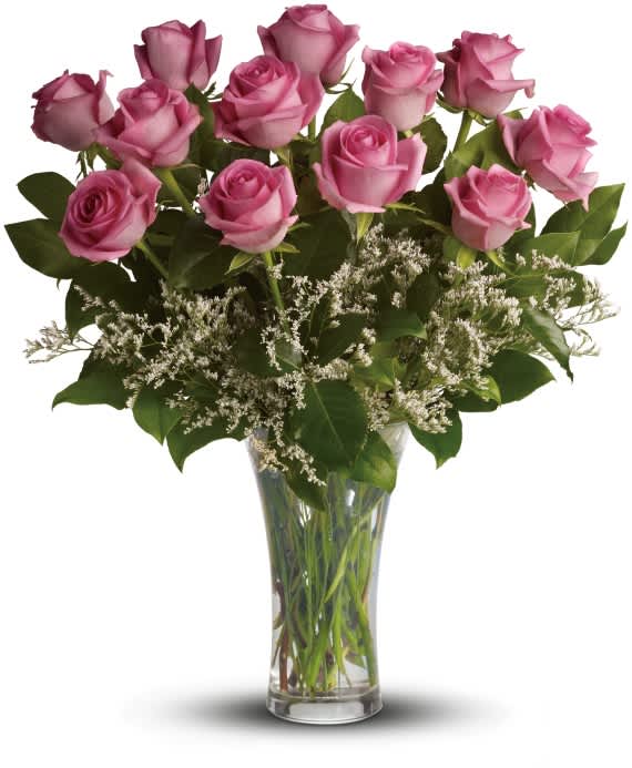 Blushing pink roses and delicate white limonium add up to a feminine