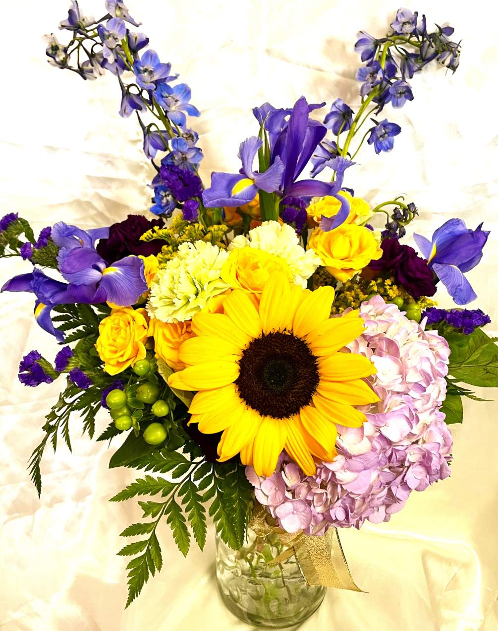 Gorgeous and colorful arrangement, sure to make anyone excited that spring is
