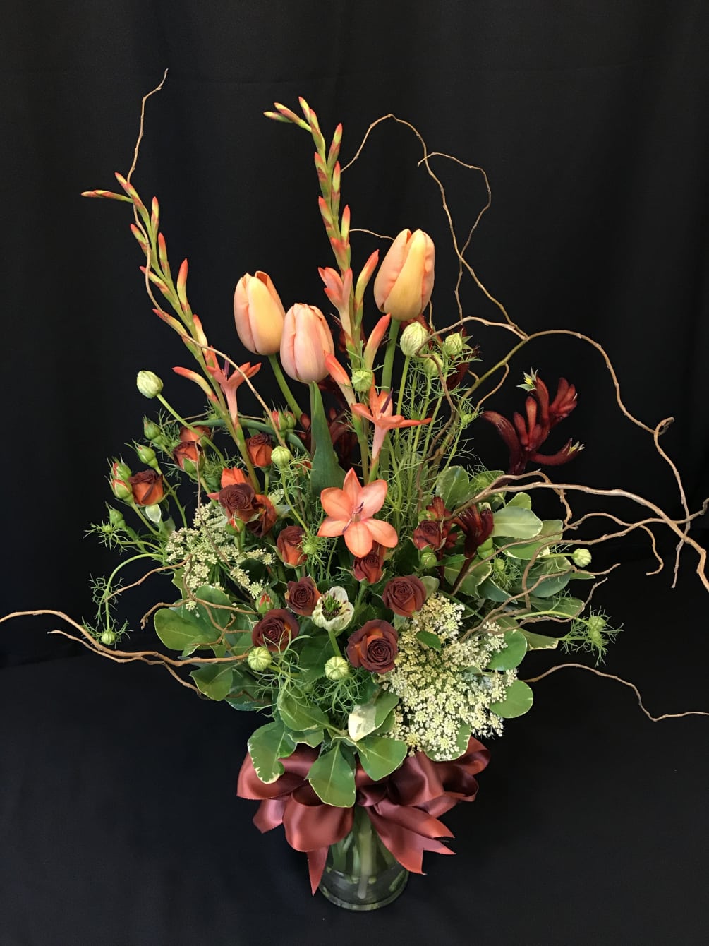 Sultry flower colors make this French tulip bouquet different and romantic. Order