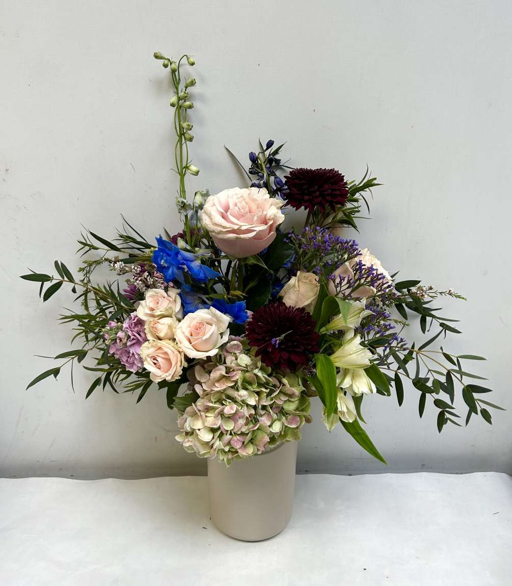 This beautiful garden vase filled with our favorites, garden roses, hydrangea, cfremones