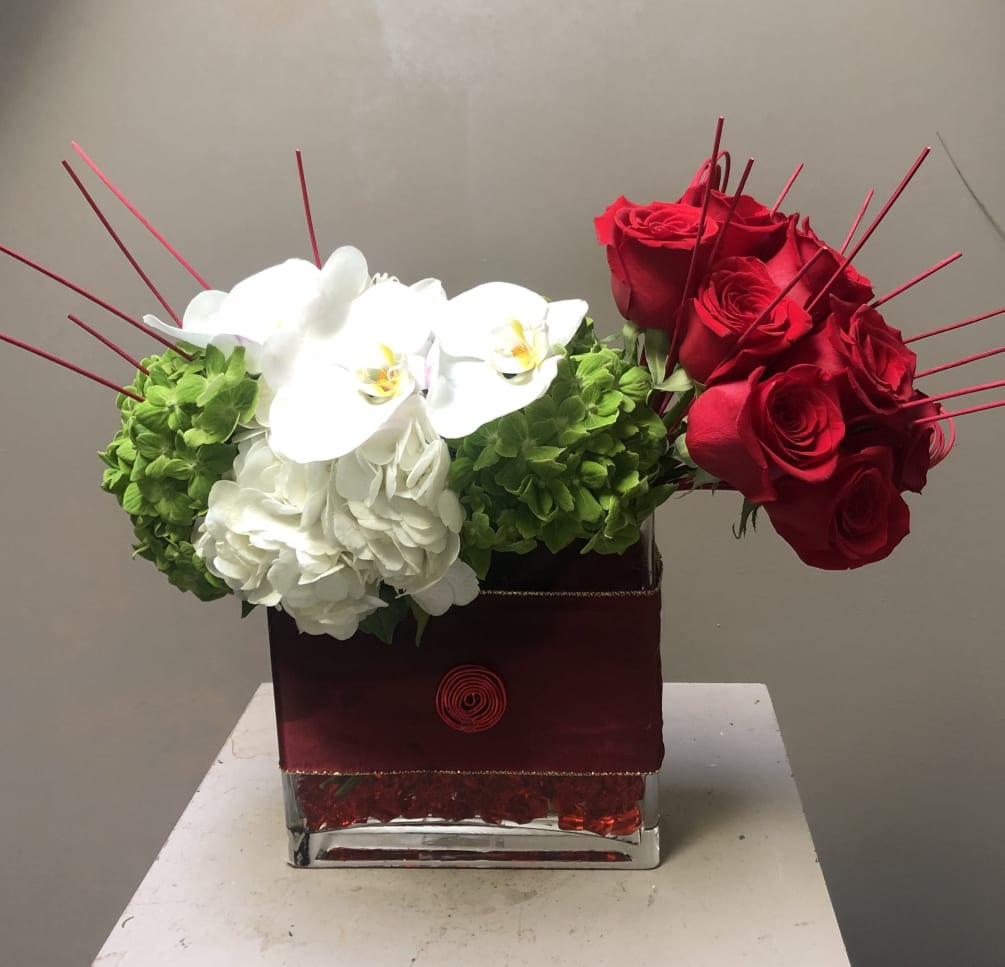 Christmas holiday, romantic occasions or any occasion.Red roses, green hydrangea, white roses