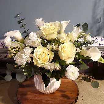 Gorgeous-All white floral arrangment- perfect for all occasions.