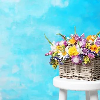 Beautiful XL basket filled to the brim with wild flowers, very colorful
