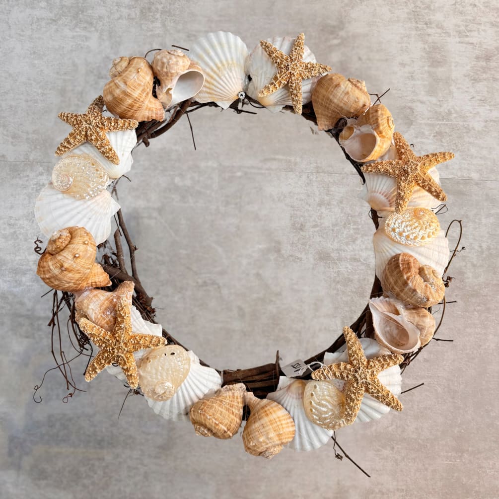 Earth-tone wreath of shells and starfish