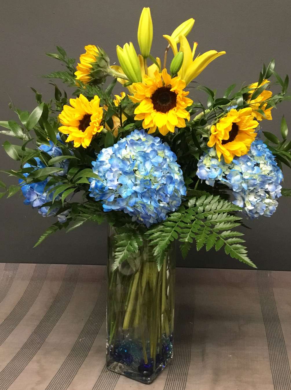 Blue Hydrangeas, Lilies and Sunflowers