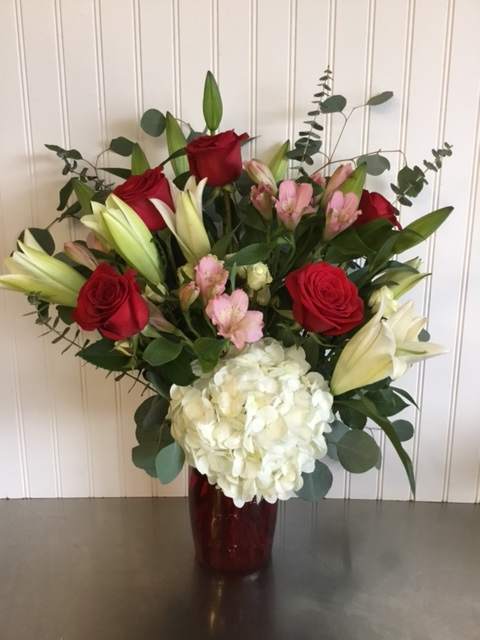 A love feast of Roses, Lillies, Hydrangea and Alstroemeria in all the