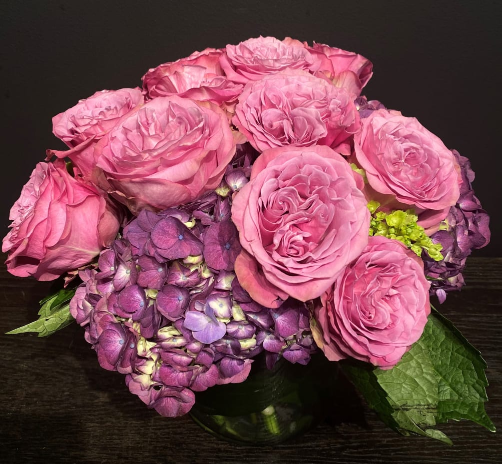 An exquisite bouquet of 12-18 large and beautiful  roses in shades