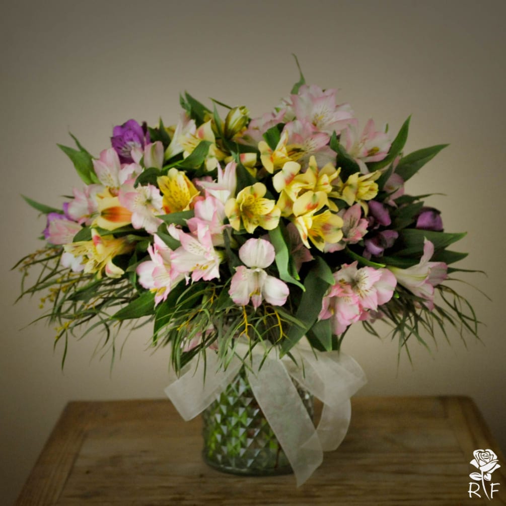 This abundant bouquet of alstroemeria, known as Peruvian lilies, will add vibrant
