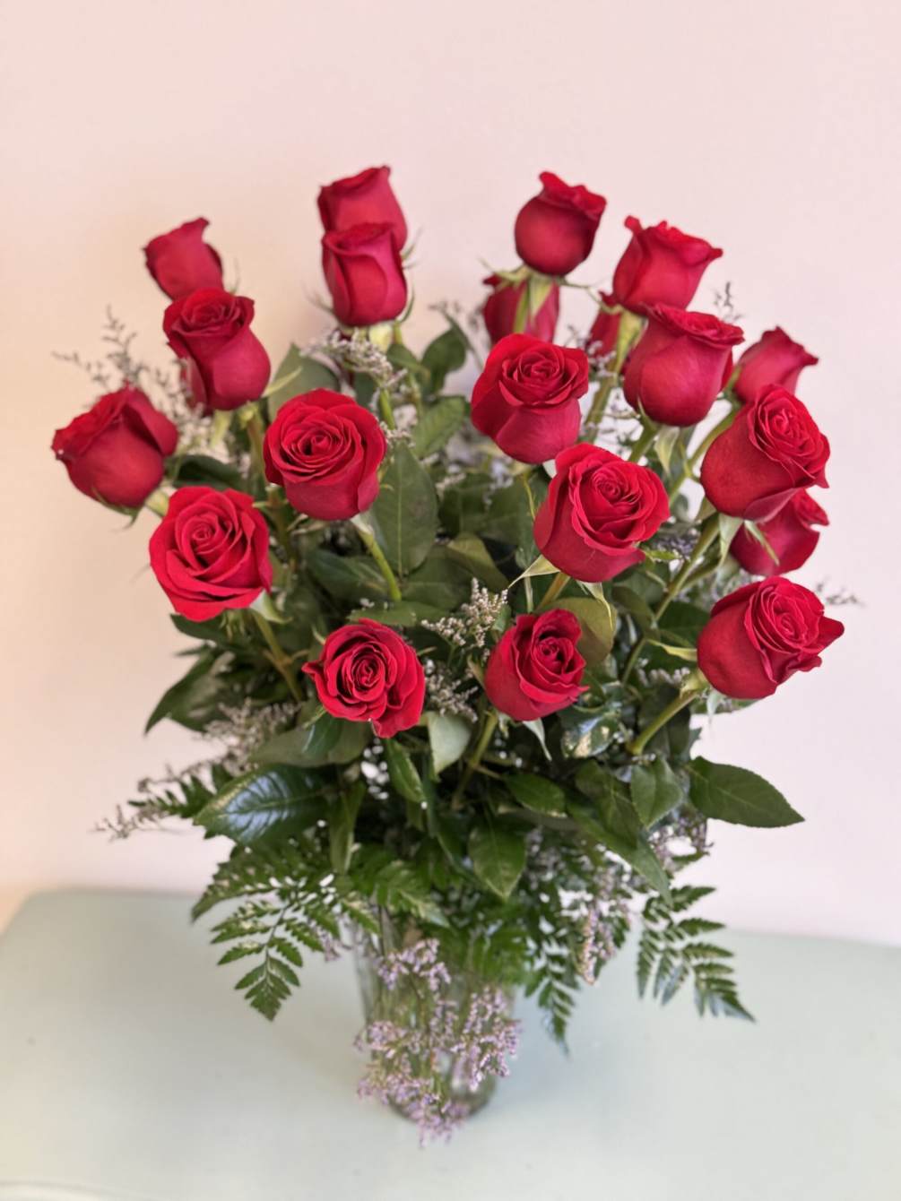 Explore your love with this impressive display of two dozen long stem