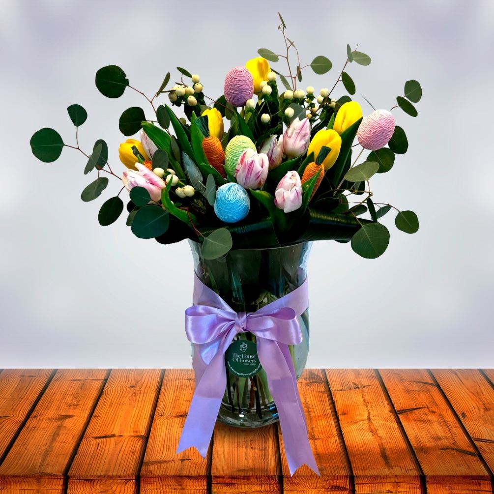 Send a selection of tulips, eggs and carrots symbolizing Easter to someone