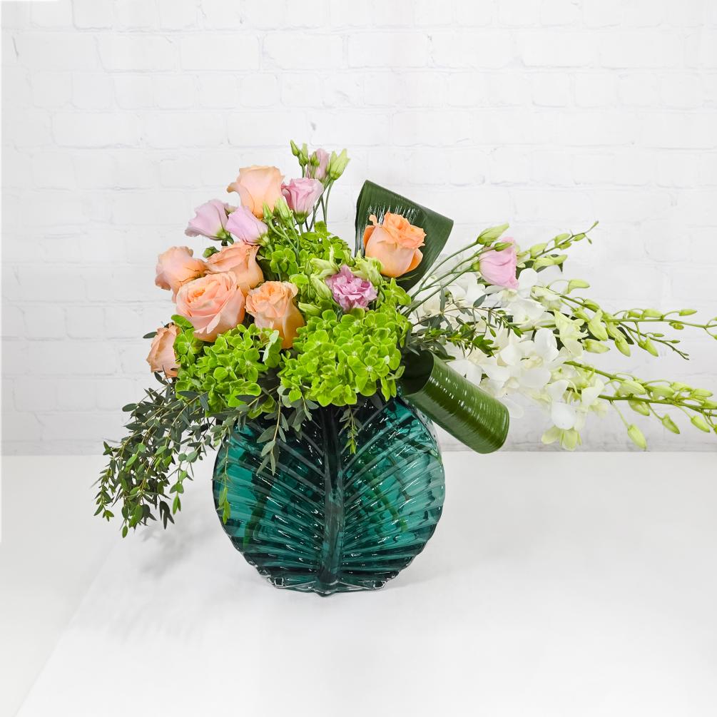 Embrace the rhythm of the tropics with our &quot;Calypso&quot; bouquet. Lush green