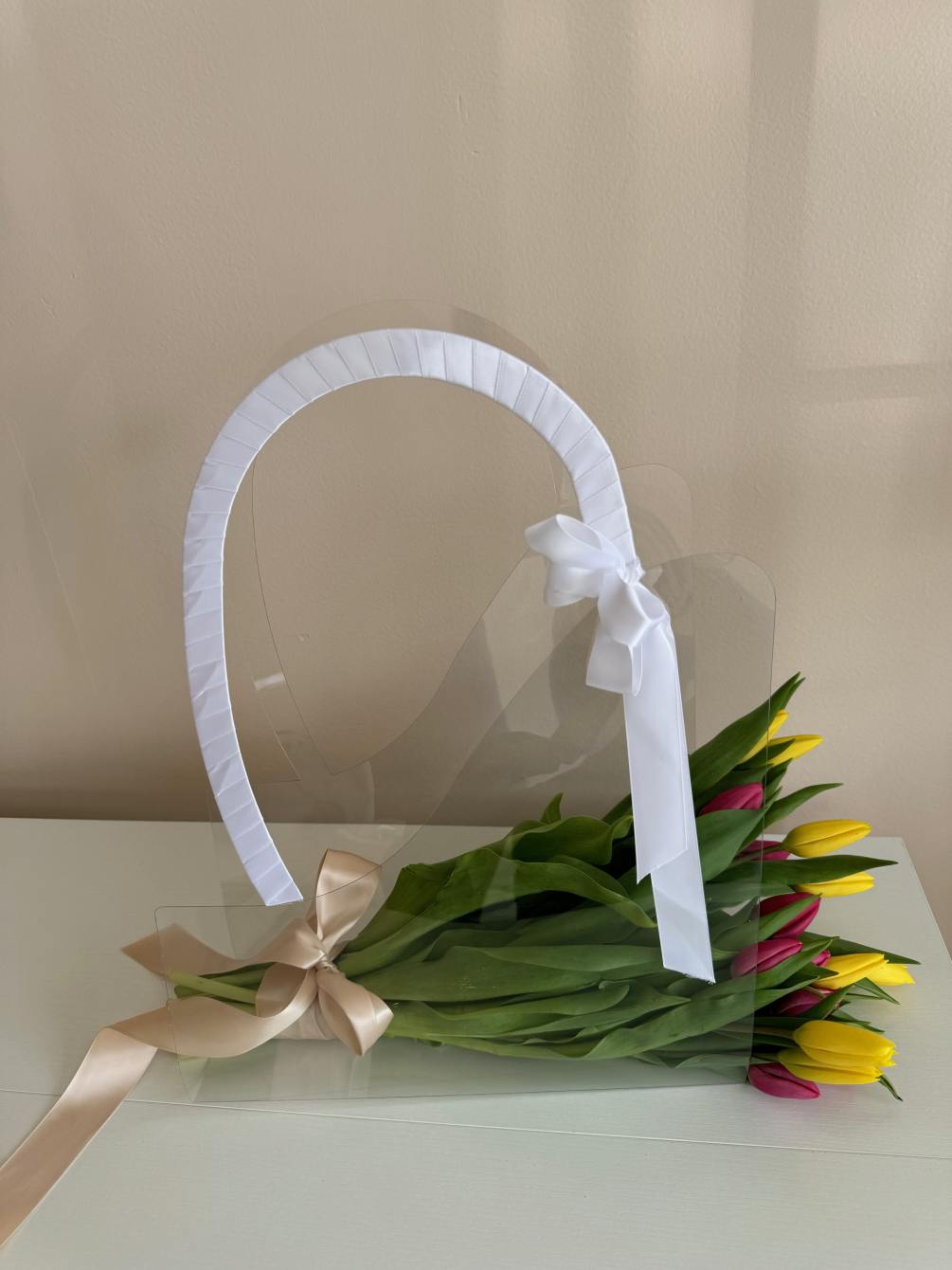 20 tulips wrapped in a clear bag bouquet