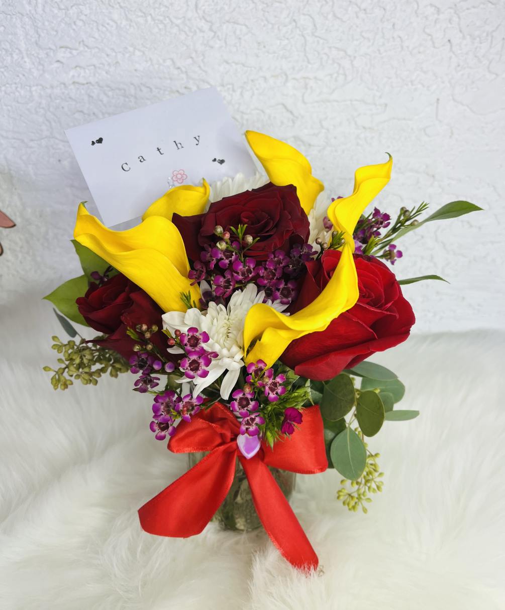 With fresh and bright seasonal flowers, a beautiful arrangement to give on