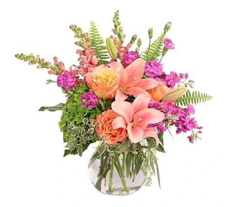 Capture their wildest dreams with this bohemian beauty! Bursting with roses, snapdragons