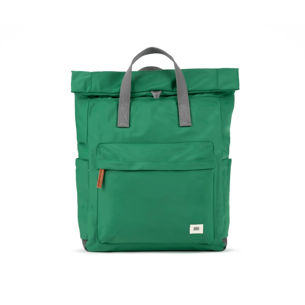 ROCK THE OUTDOOR LOOK WITH OUR MINIMALIST-DESIGN, ROLL-TOP BACKPACK WITH A LARGE