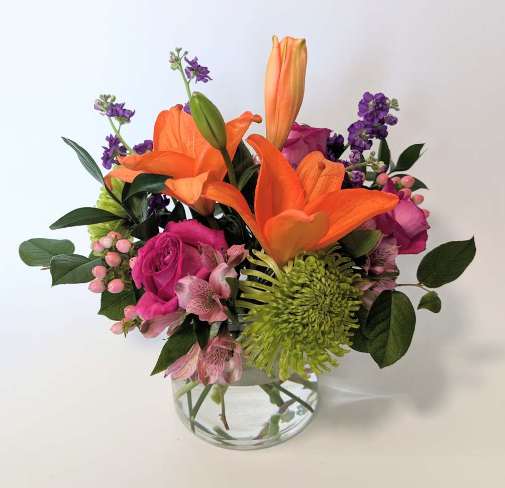 Beautiful and bright vibrant blooms like fragrant orange lilies, hot pink roses