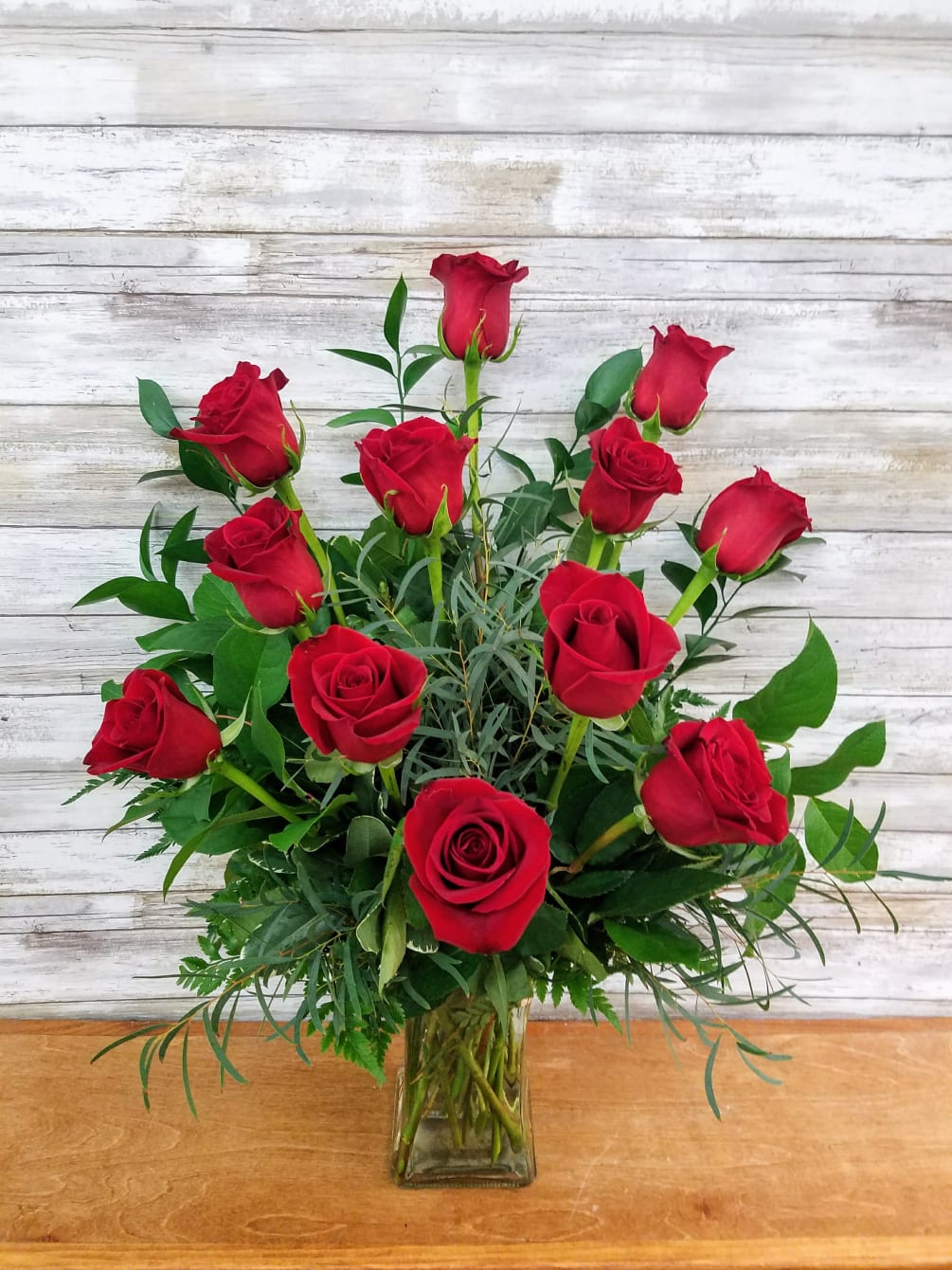 A Classic Arrangement for Any Occasion. 
12 premium long stem red roses
