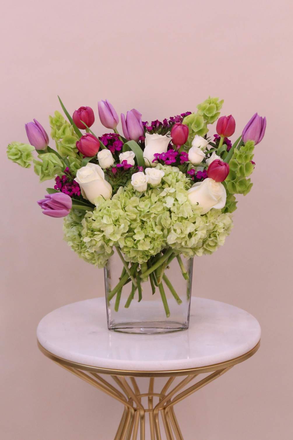 A lovely mix of spring flowers. May include roses, tulips, hydrangeas, spray